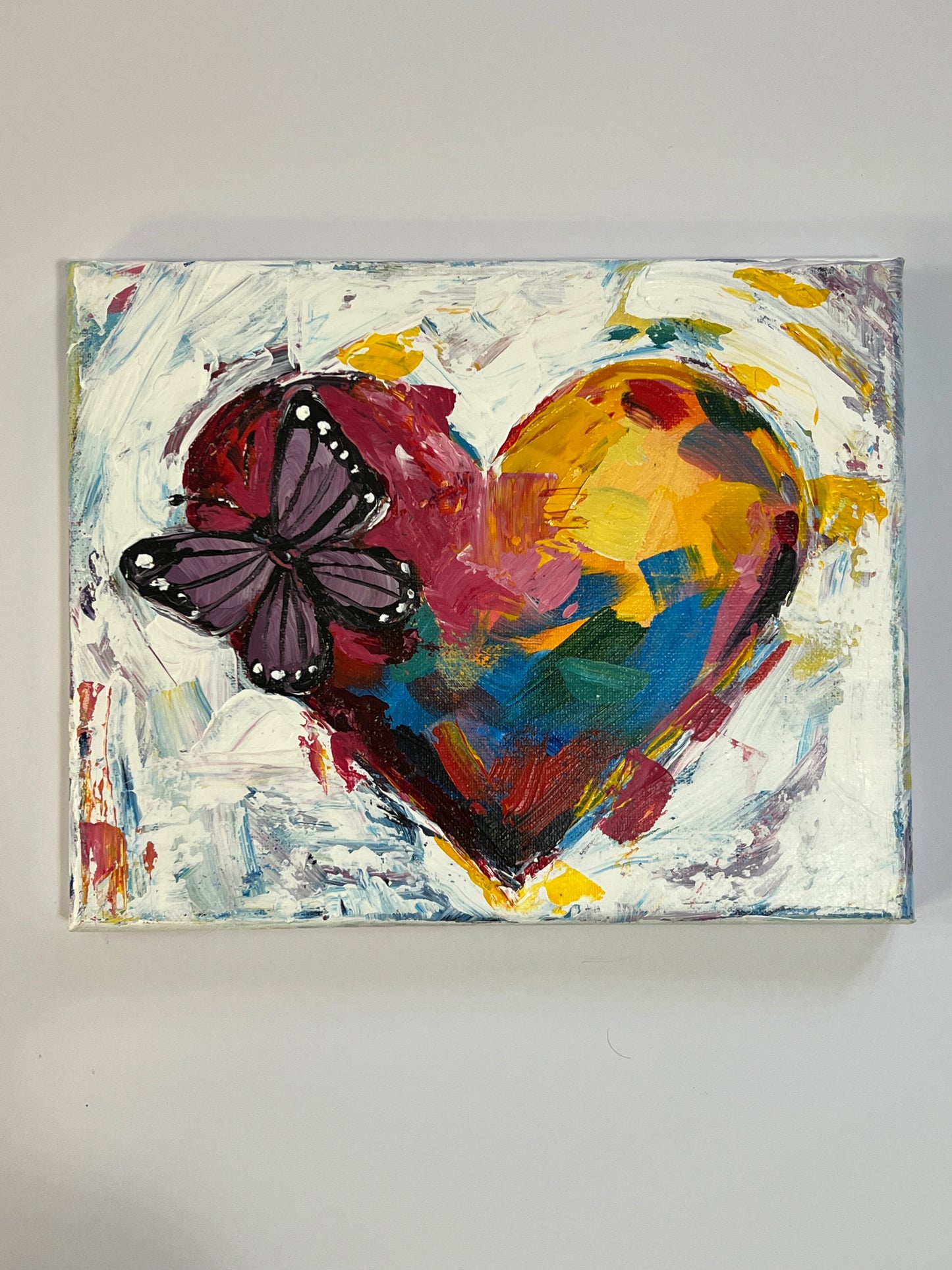 Colorful heart with butterfly