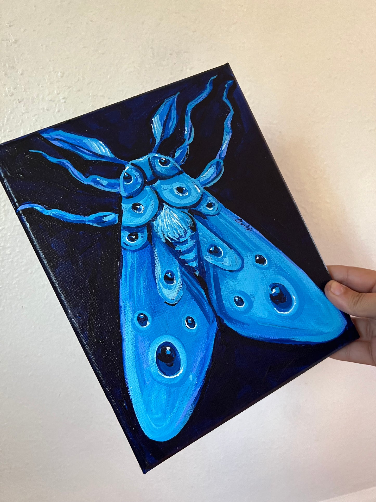 Blue moth painting